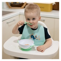 Adjustable baby silicone bib with pocket Akuku whale mint