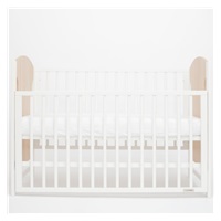 New Baby MIA crib with pull-down sidewall oak