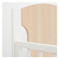 New Baby MIA crib with pull-down sidewall oak